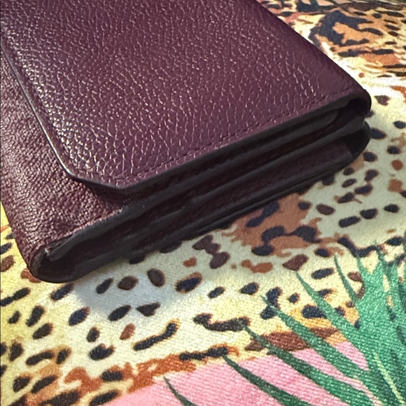 Michael Kors Plum Textured Wallet - Picture 3 of 11